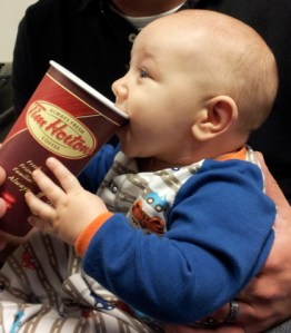 Canadian baby and Tim Horton cup